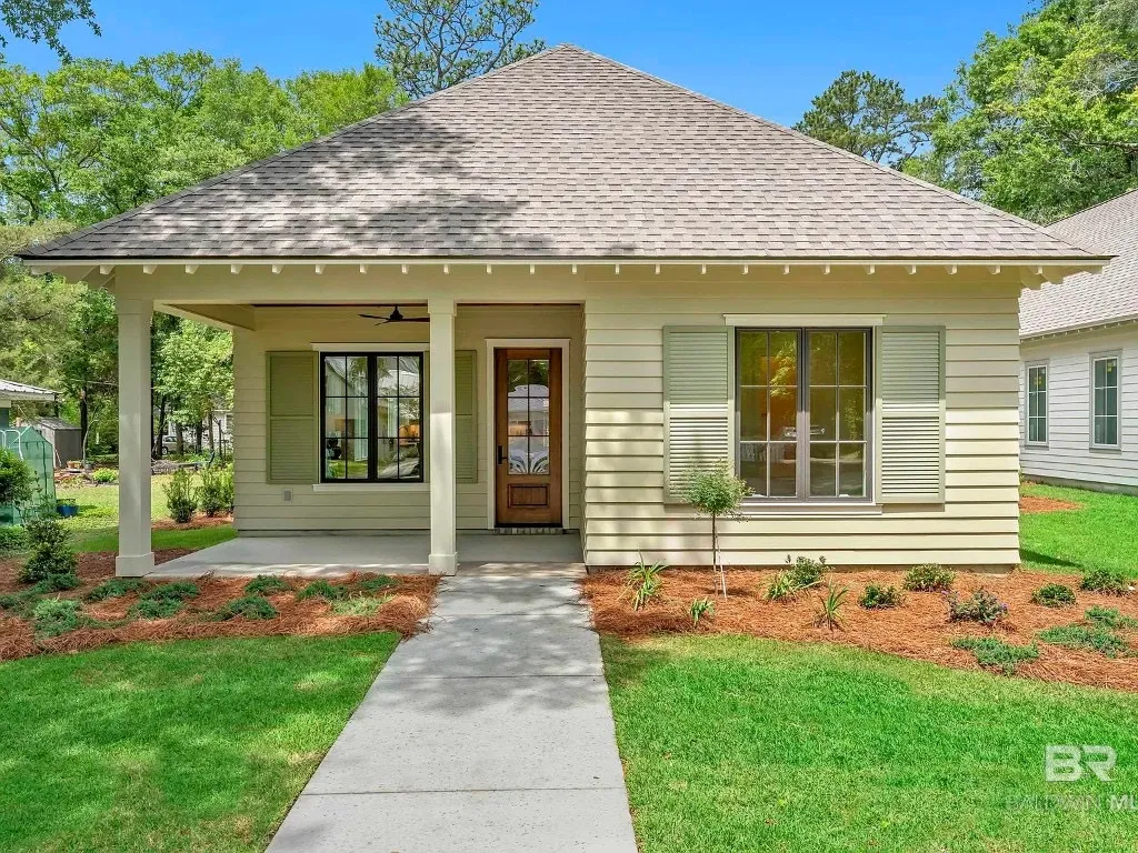Front porch and green shutters at 410 Azalea Street in Fairhope